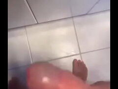 Masturbating