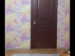 Crossdresser smokes and poses in long tight dress