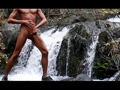 Jerking off by the waterfall